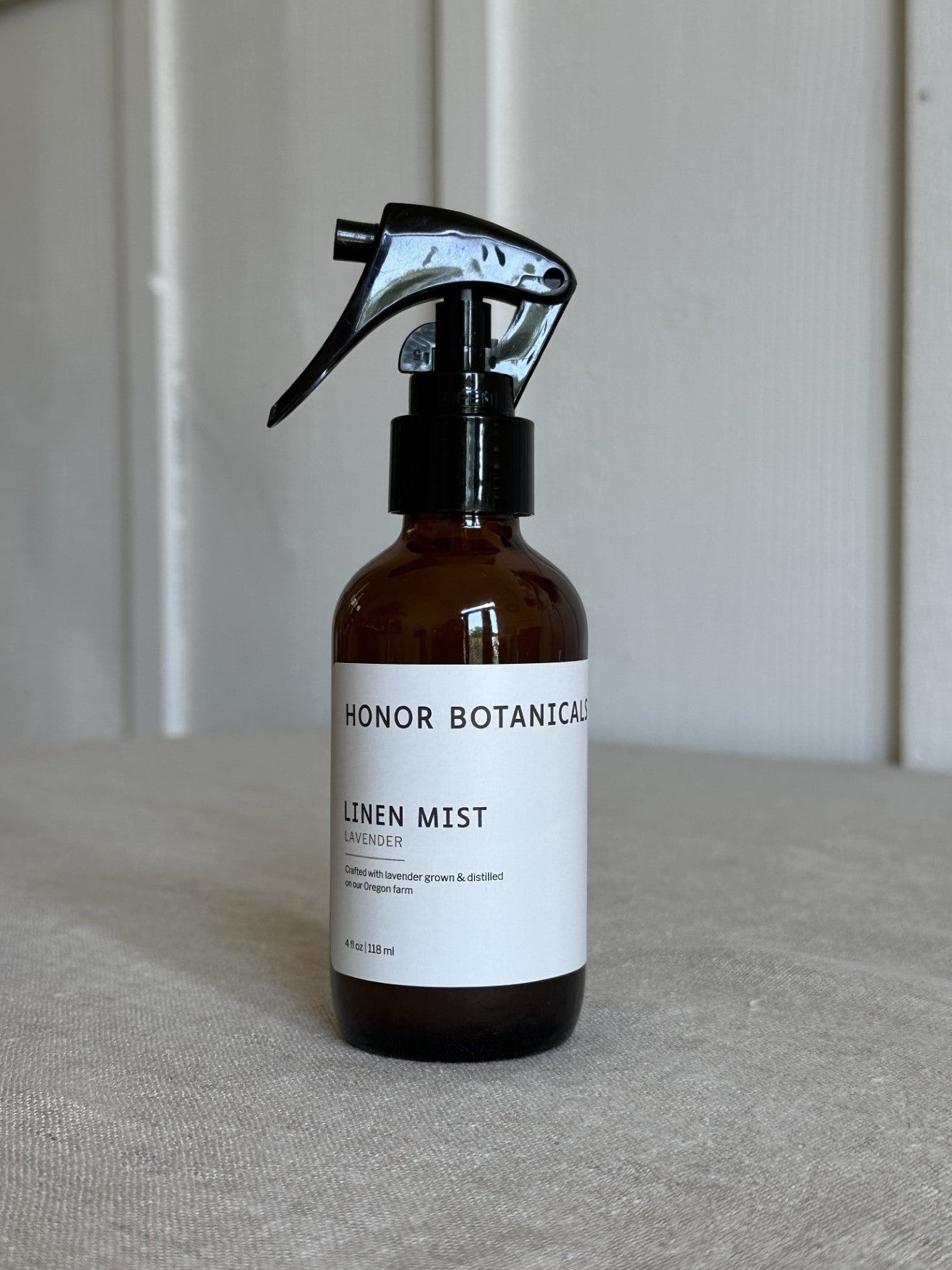 Lavender linen mist in an amber glass bottle and fine mist trigger sprayer